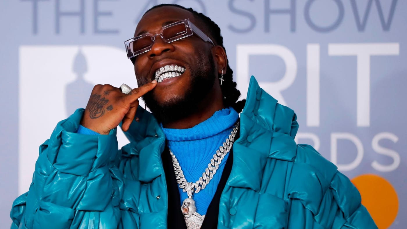 Singer Burna Boy Kicks A Fan In the Face during his live performance